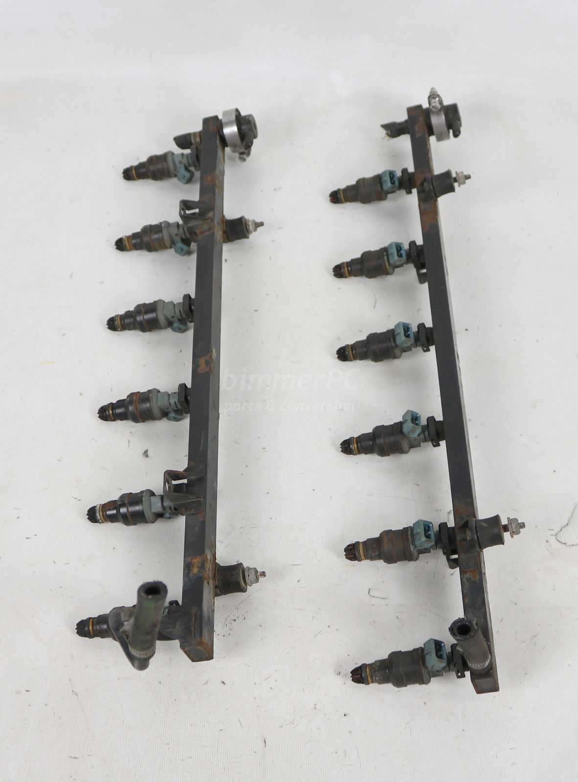 Picture of BMW 3531729587 Engine Fuel Rails w Injectors Left Right Set M70 V12 E32 E31 Early for sale