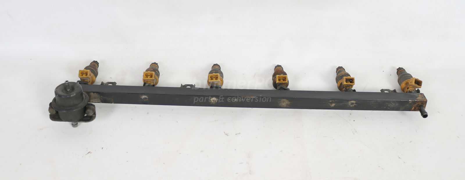 Picture of BMW 13531719916 M30 Engine Fuel Rail w Yellow Top Injectors E34 E32 E24 for sale